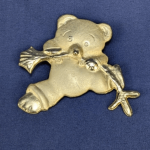 Vintage Teddy Bear Wearing Overalls Brooch with Branch Accent Gold Tone 2"