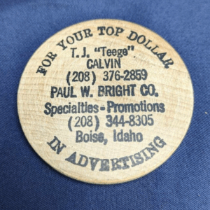 Boise, Idaho Paul W. Bright Co. T.J. Calvin Vintage Wooden Dollar