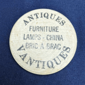 Antiques Vantiques Vintage Wooden Nickel Advertisement