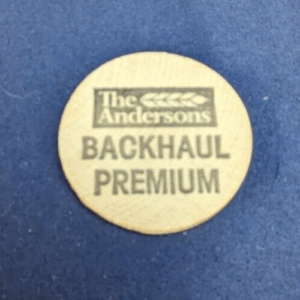 The Andersons Backhaul Premium Wooden Nickel Vintage Souvenir Advertisement