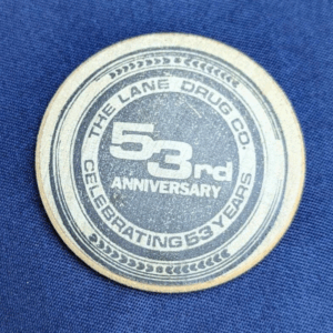 The Lane Drug Company 53rd Anniversary Vintage Wooden Nickel