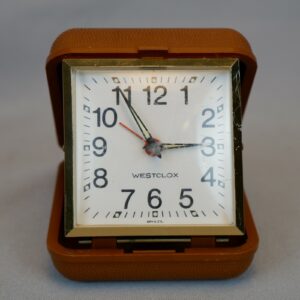 VINTAGE BROWN WESTCLOX BRAZIL WINDING TRAVEL ALARM CLOCK WITH BUILT-IN CASE
