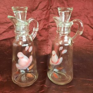 2 VINTAGE ANCHOR HOCKING SMALL CLEAR GLASS CRUETS, H-PAINTED W/PINK FLOWERS