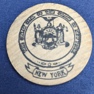 The Great Seal of The State of New York Wooden Nickel Advertisement